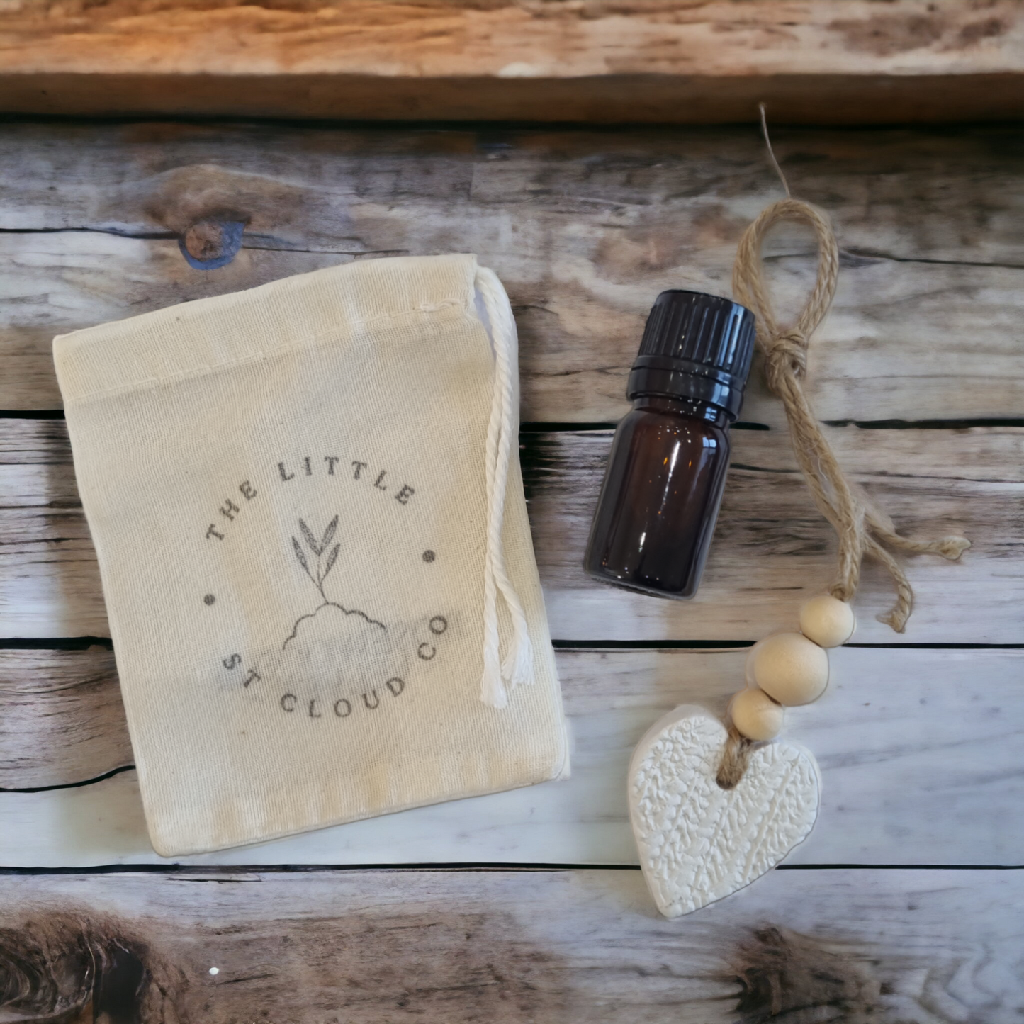 Cream Clay Heart Air Freshener with a Cotton Bag and Bottle of fragrance oil