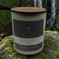 Black Moss Pot Scented candle in frosted jar with wooden lid