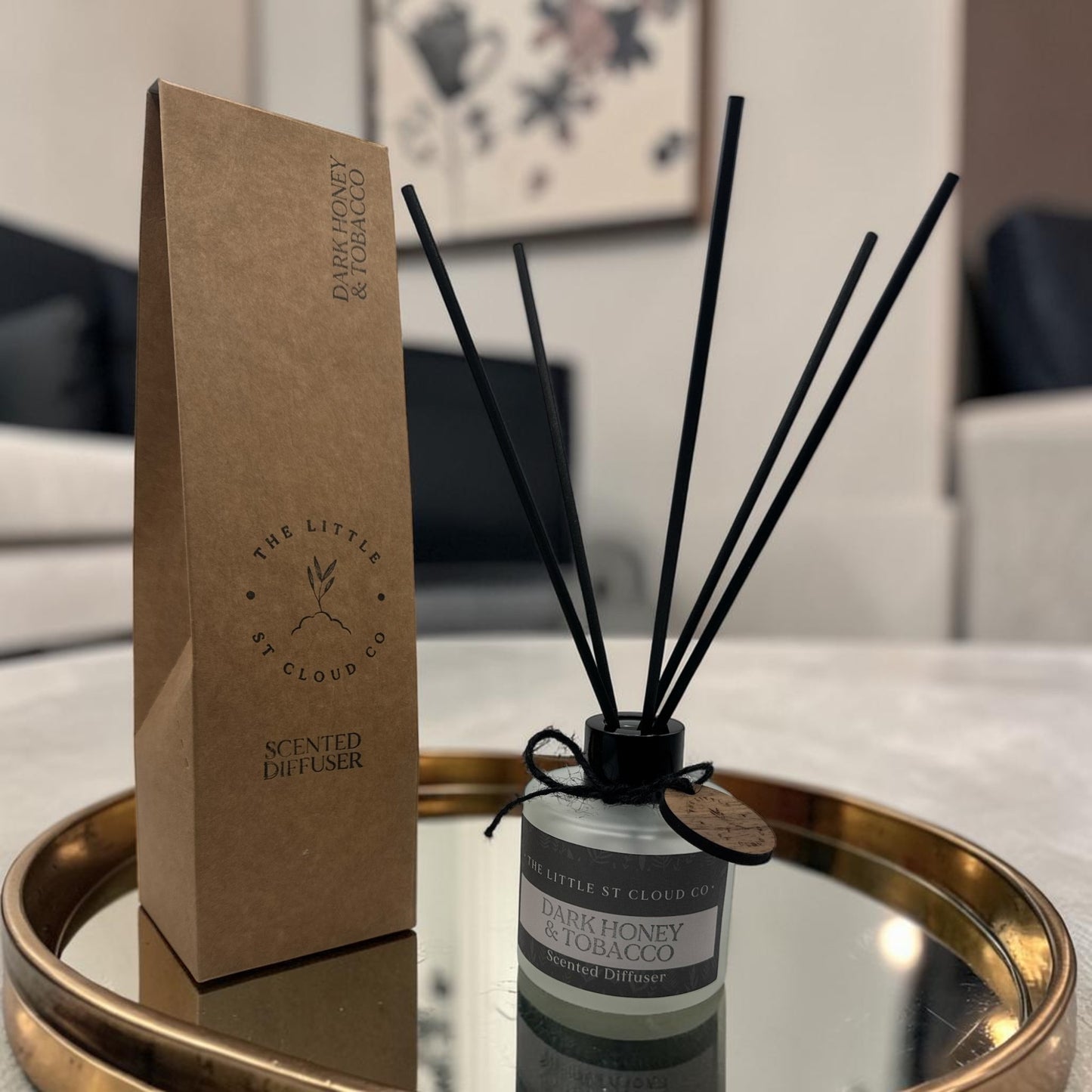 Scented diffuser with packaging on a mirror